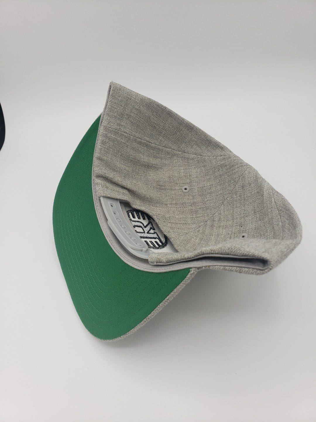 Kastaplast Solid Back Snapback Cap disc golf disc top view