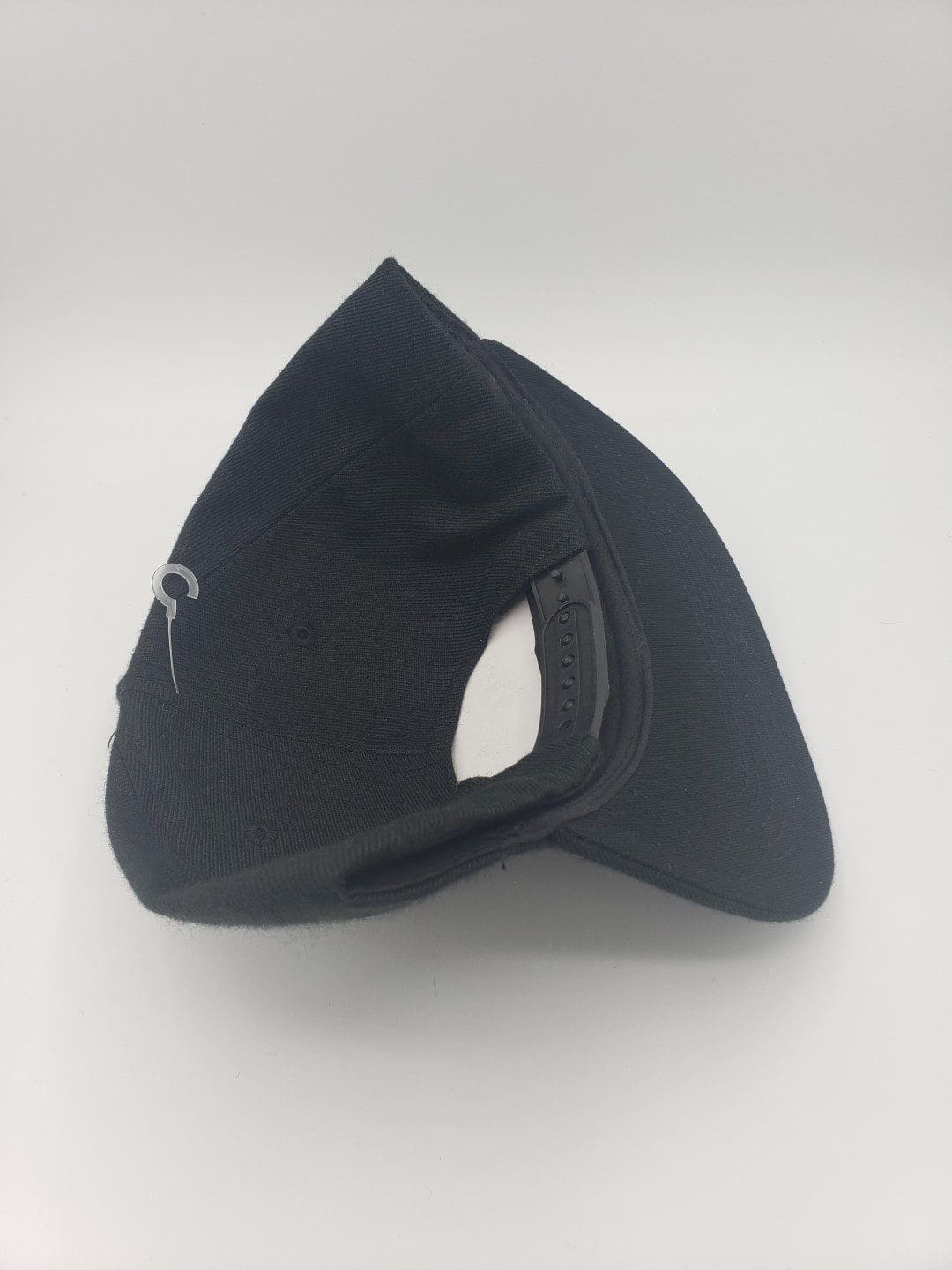 Kastaplast Solid Back Snapback Cap disc golf disc side view