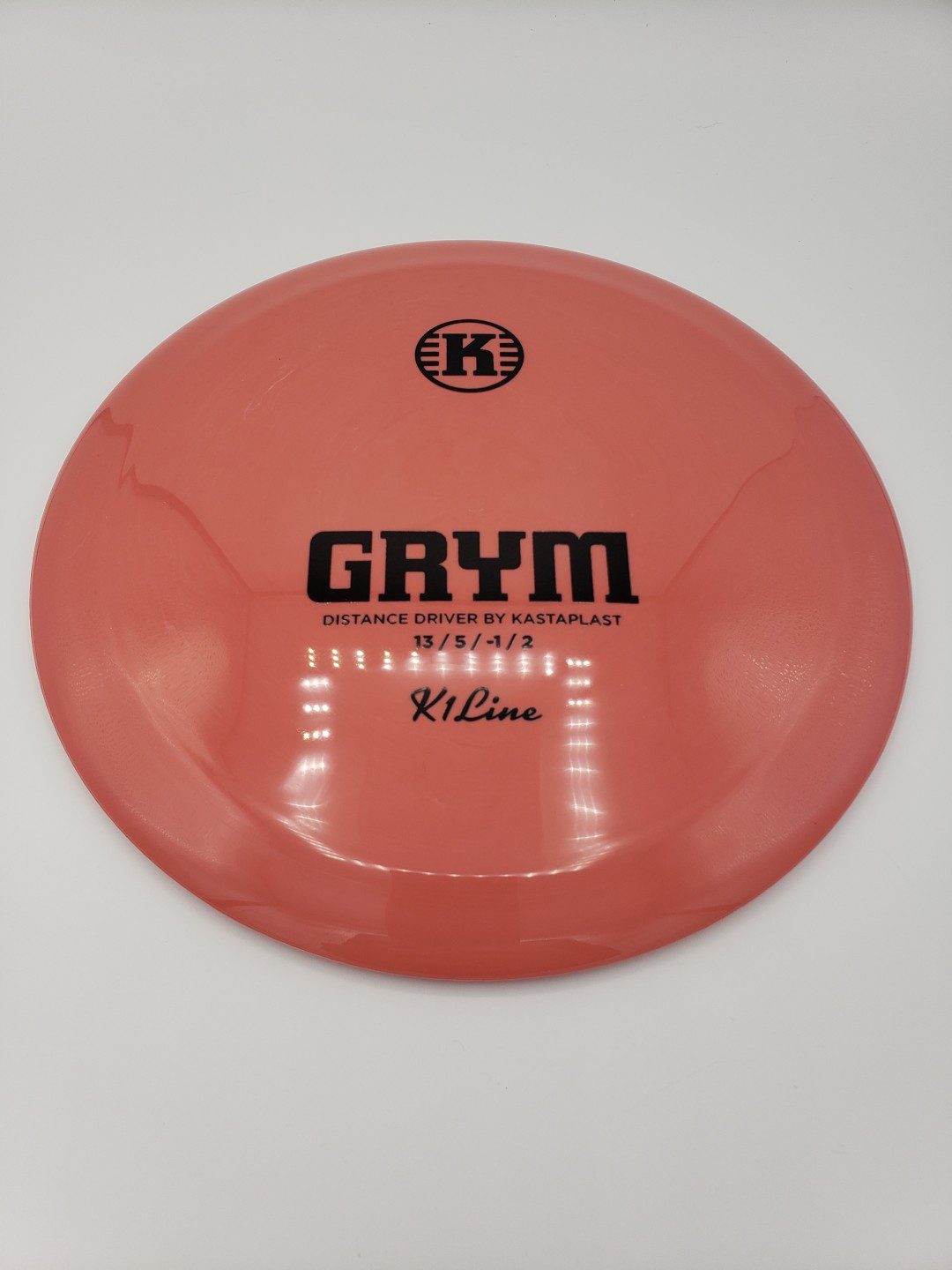 Kastaplast K1 Grym pinkblack disc golf disc front view