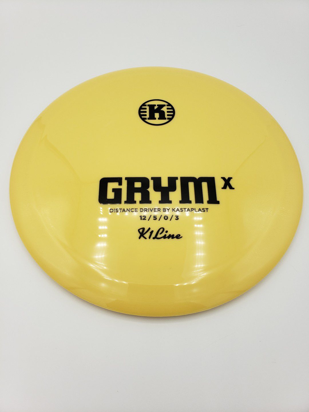 Kastaplast K1 Grym X buttermilk disc golf disc front view