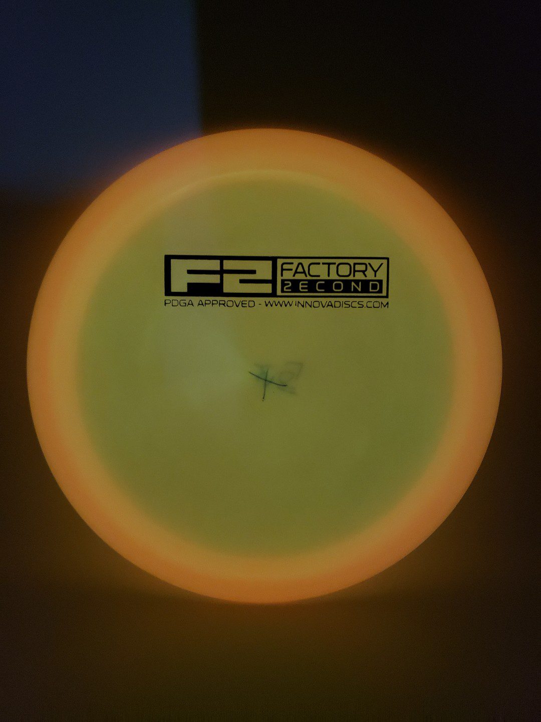 Innova F2 Glow Champion Shryke disc golf disc side view