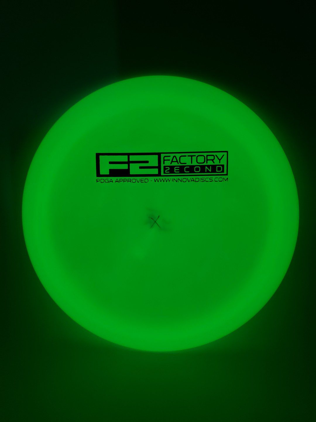 Innova F2 Glow Champion Shryke disc golf disc detail view