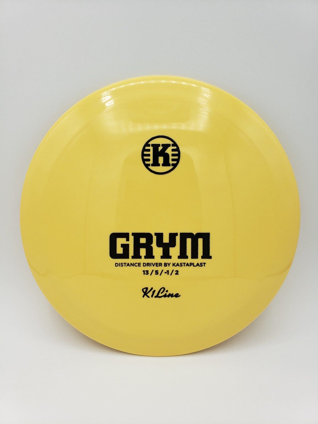 Kastaplast K1 Grym buttermilk disc golf disc front view