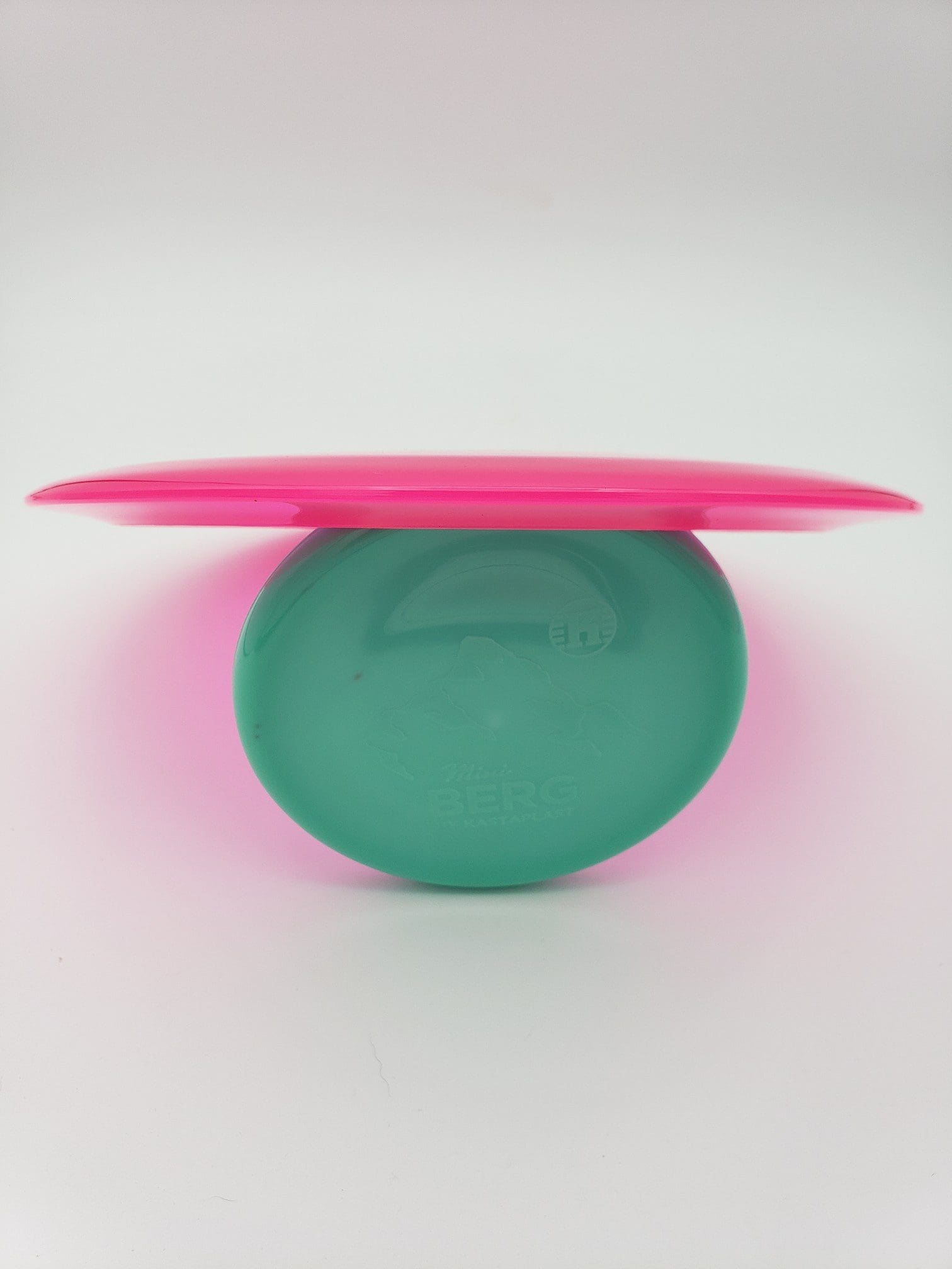 Kastaplast K1 Grym hot pink disc golf disc back view
