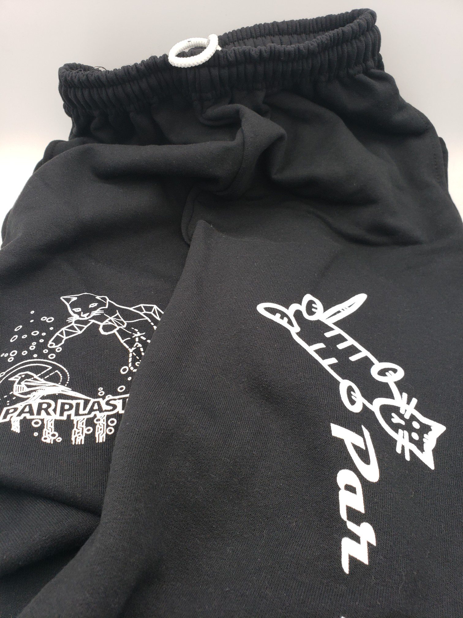 Par Plastics Sweatpants disc golf disc back view