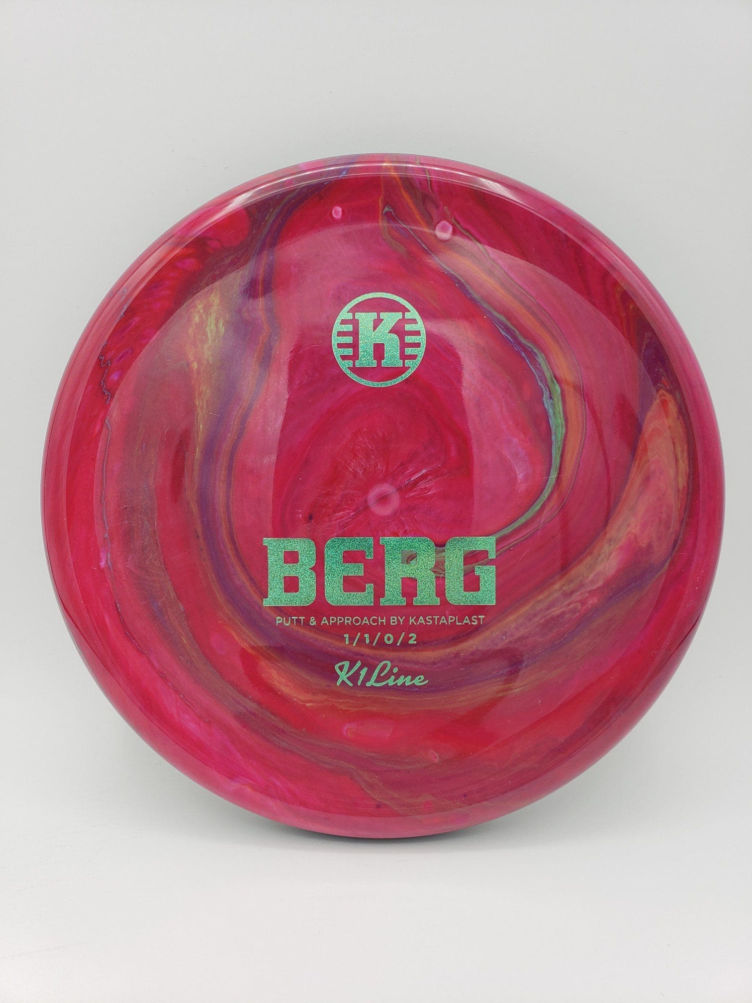 Mad Hatter Dyes volume 1 disc golf disc side view