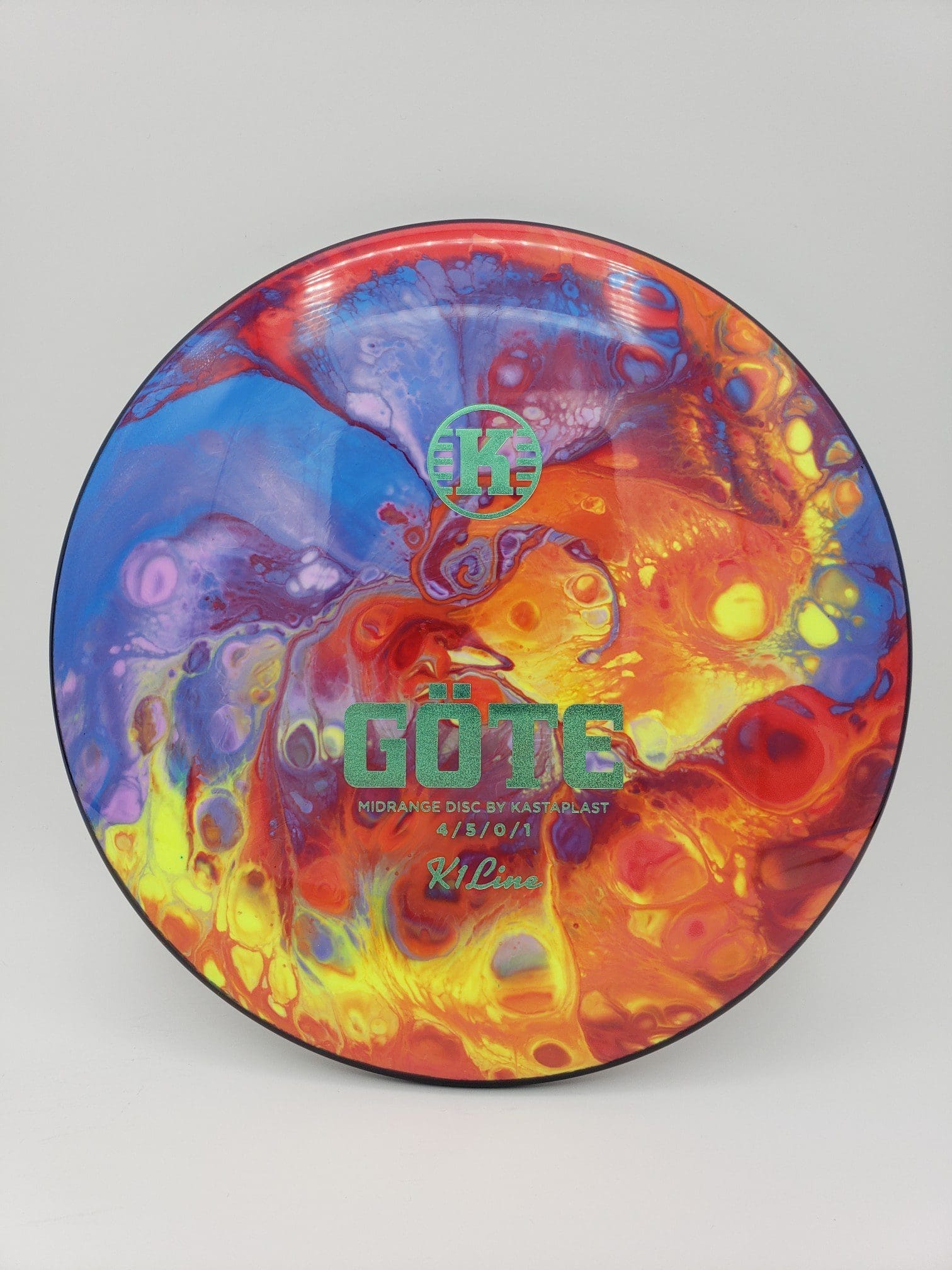 Mad Hatter Dyes volume 1 disc golf disc front view