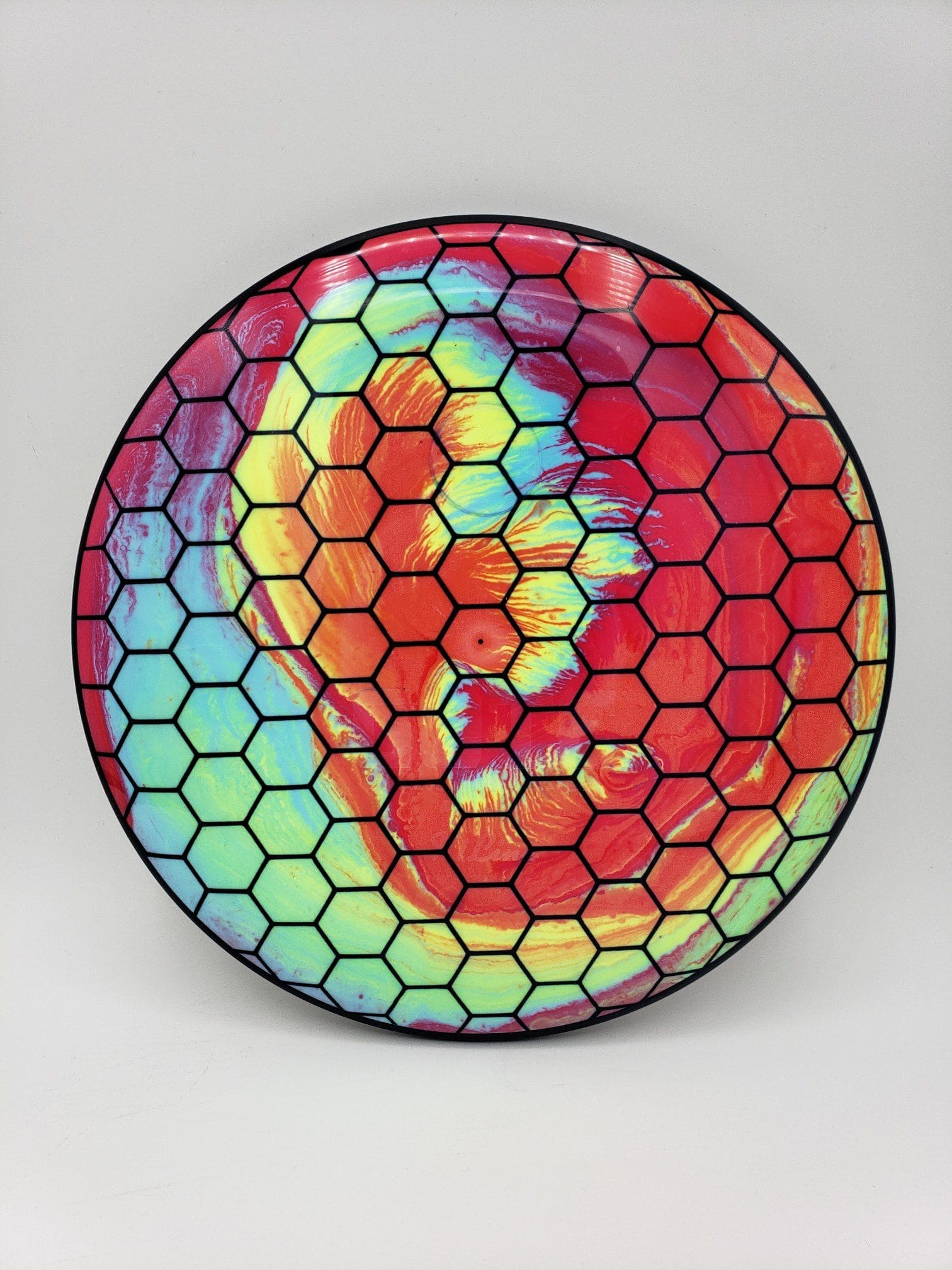 Mad Hatter Dyes volume 1 disc golf disc side view