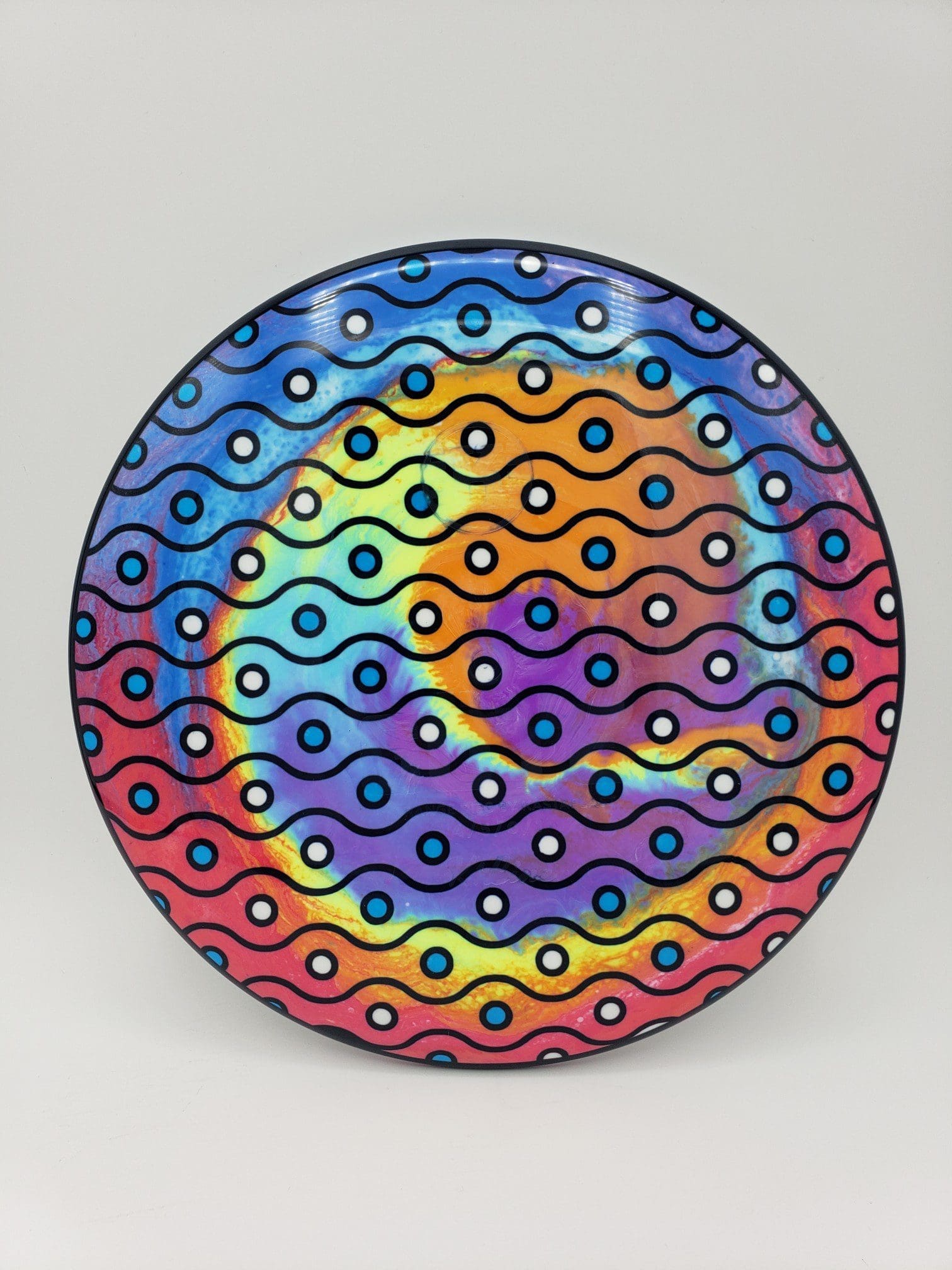 Mad Hatter Dyes volume 1 disc golf disc top view