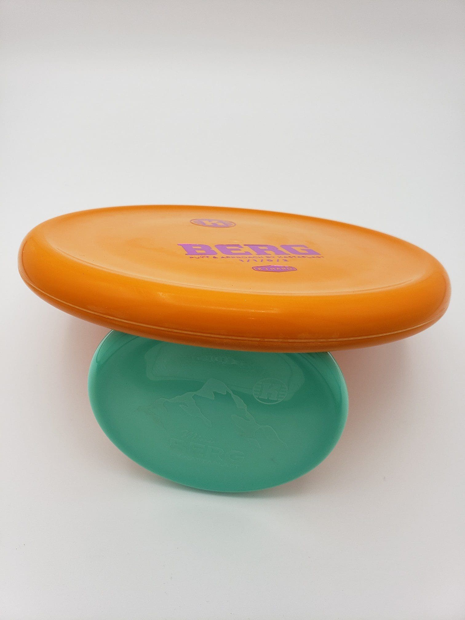 Kastaplast K3 Hard Berg orange disc golf disc back view