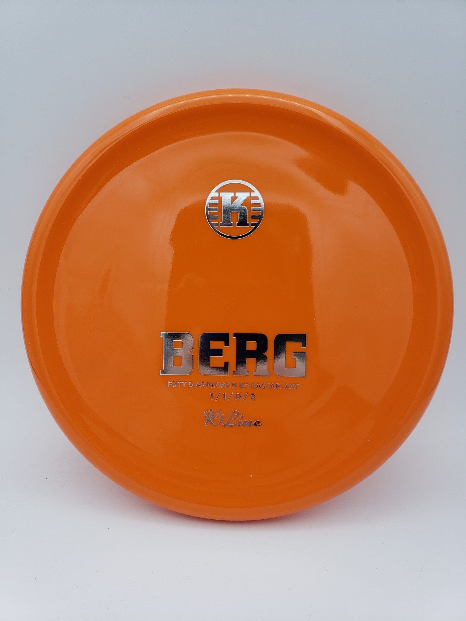 Kastaplast K1 Berg orange disc golf disc front view