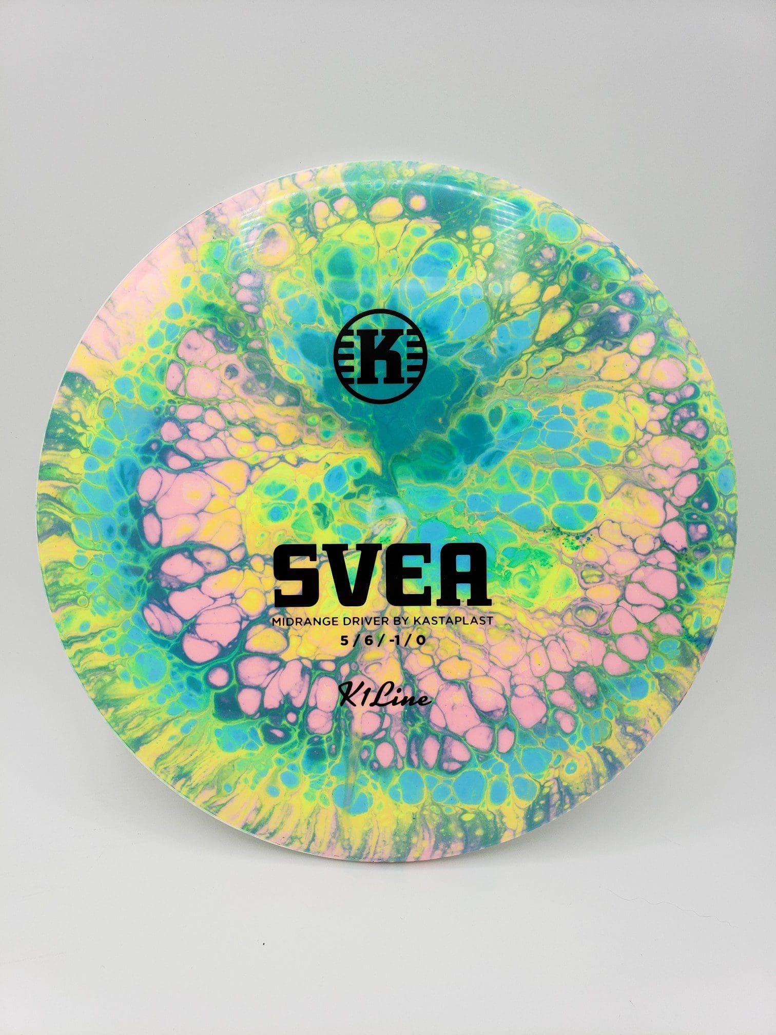 Wicked Wizard Dyes volume 1 disc golf disc side view