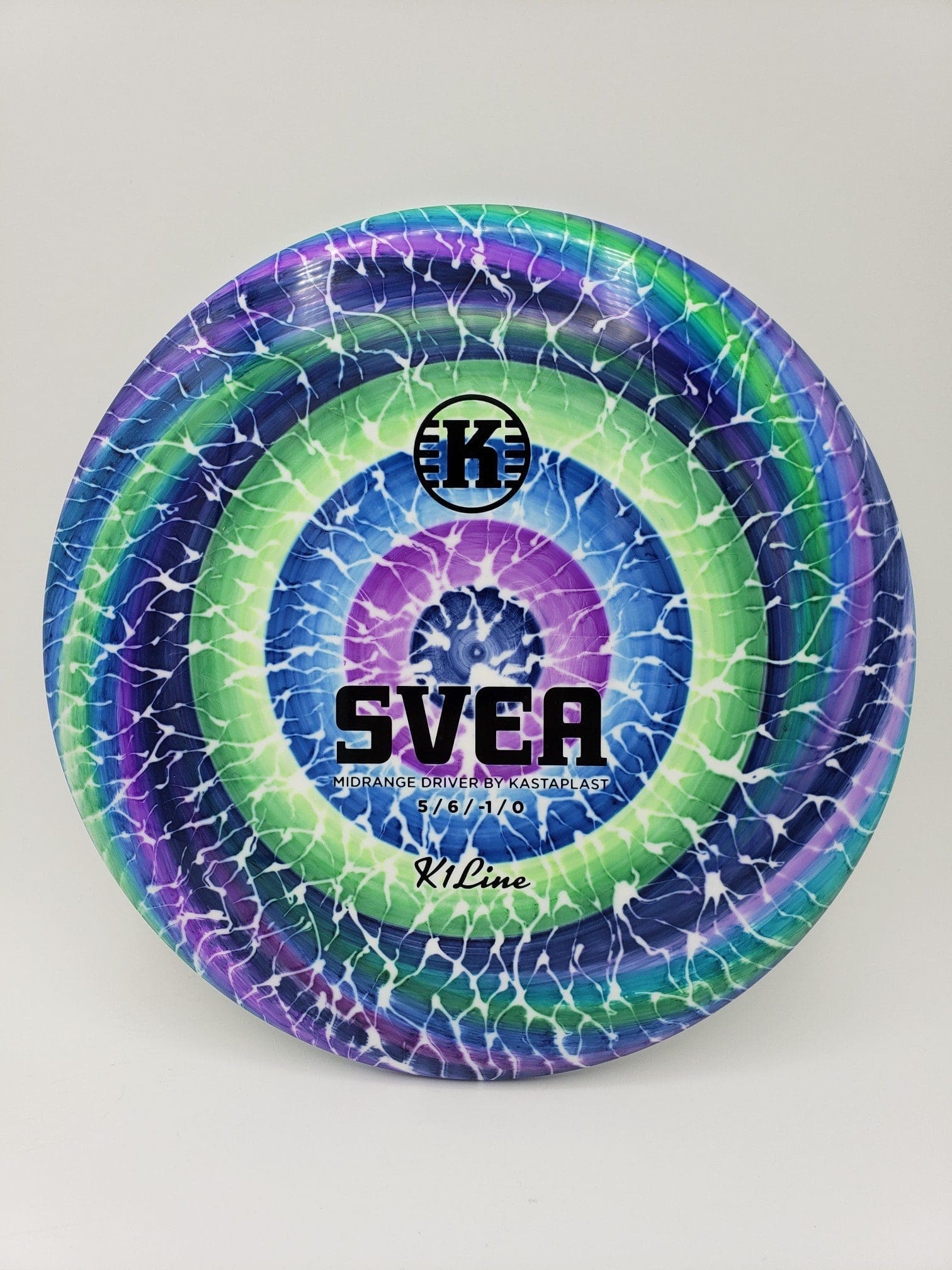 Monkey Grip Dyes volume 1 disc golf disc top view