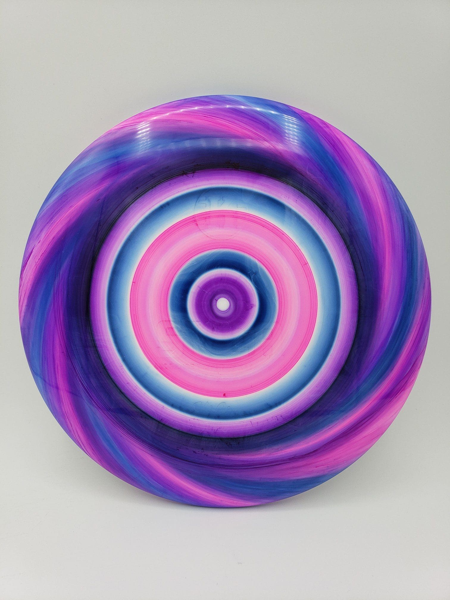 Monkey Grip Dyes volume 1 disc golf disc side view