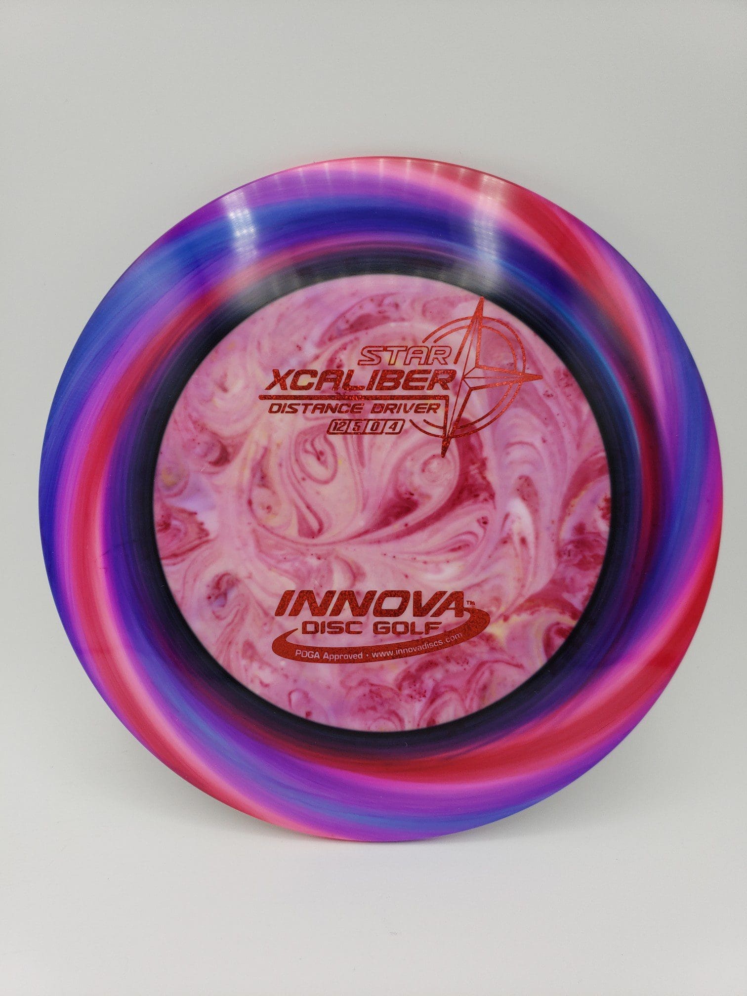 Monkey Grip Dyes volume 1 disc golf disc top view