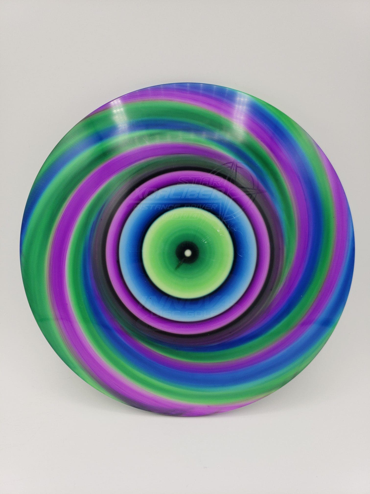 Monkey Grip Dyes volume 1 disc golf disc side view