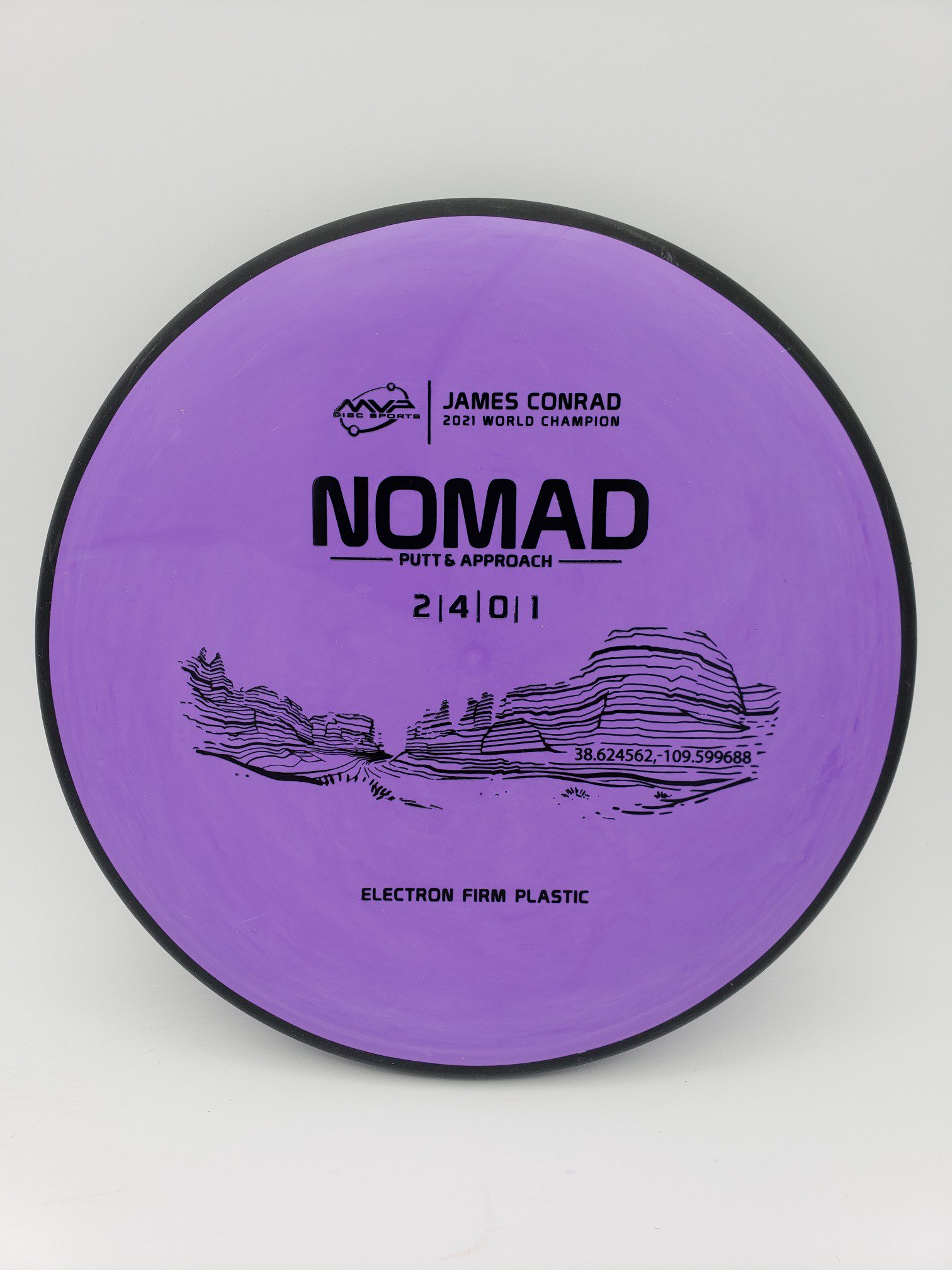 MVP James Conrad Signature Nomad Electron Firm disc golf disc front view