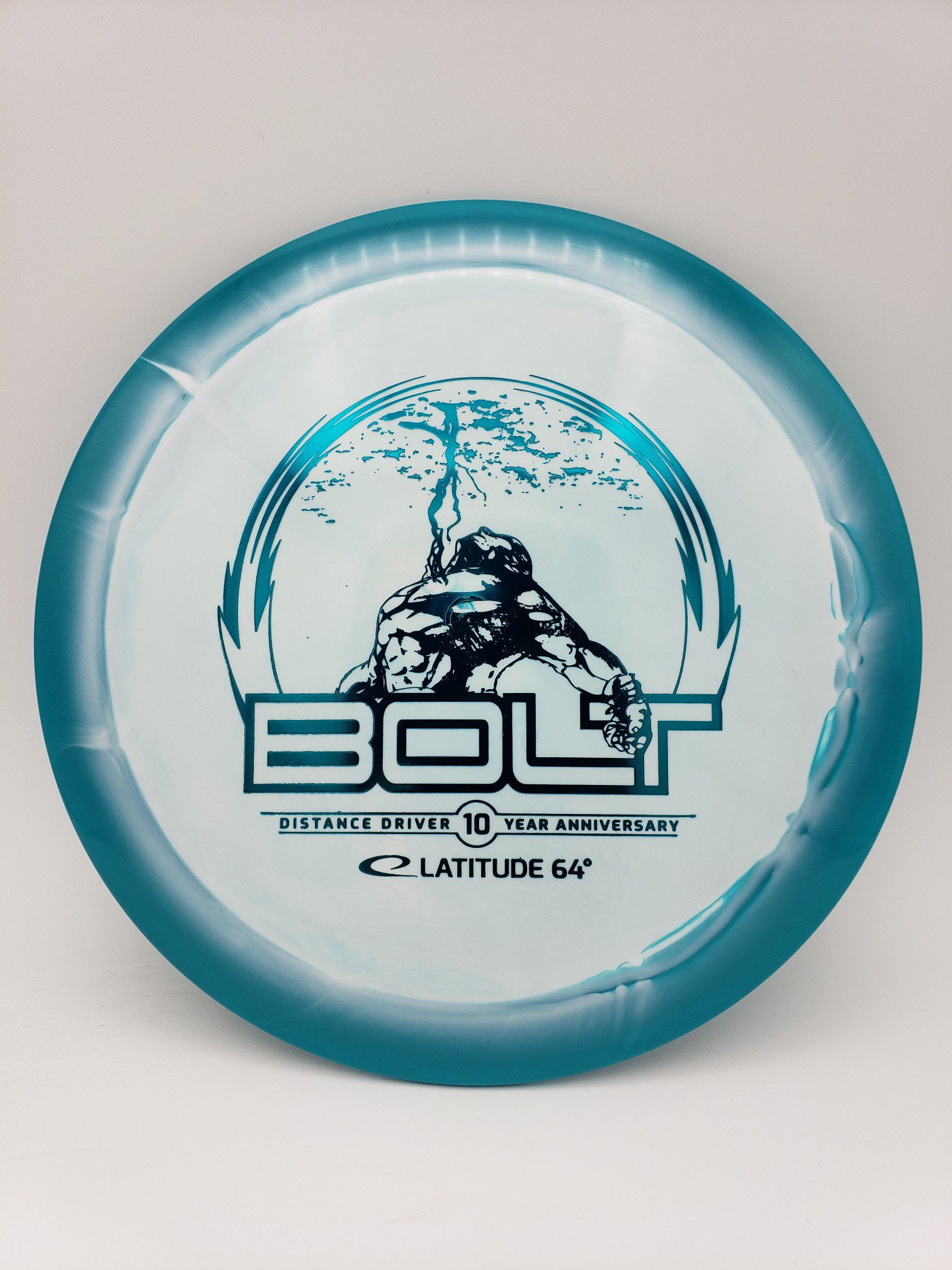Latitude 64 Gold Orbit Bolt 10 year anniversary disc golf disc front view