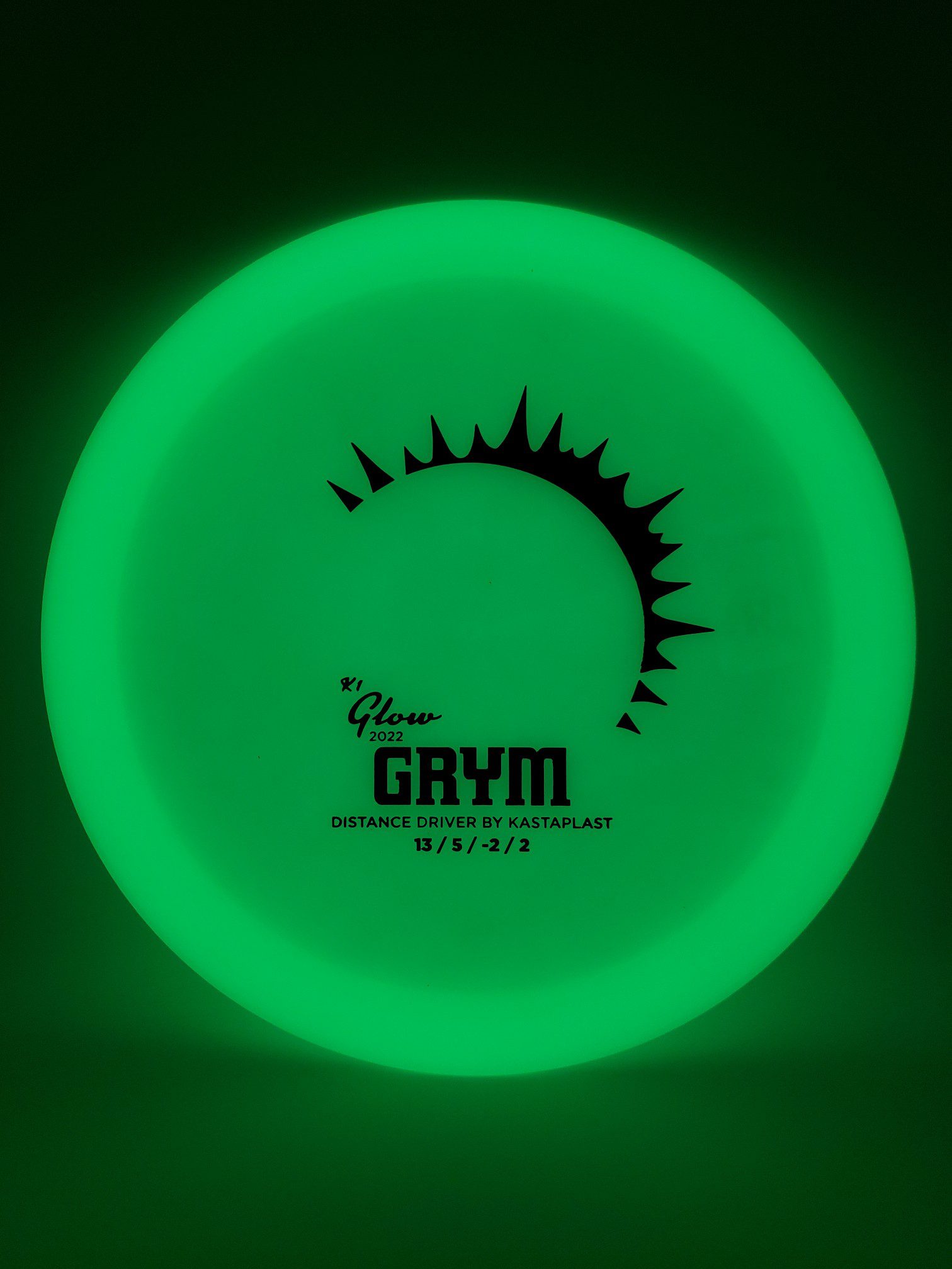 Kastaplast K1 Glow Grym 2022 disc golf disc front view