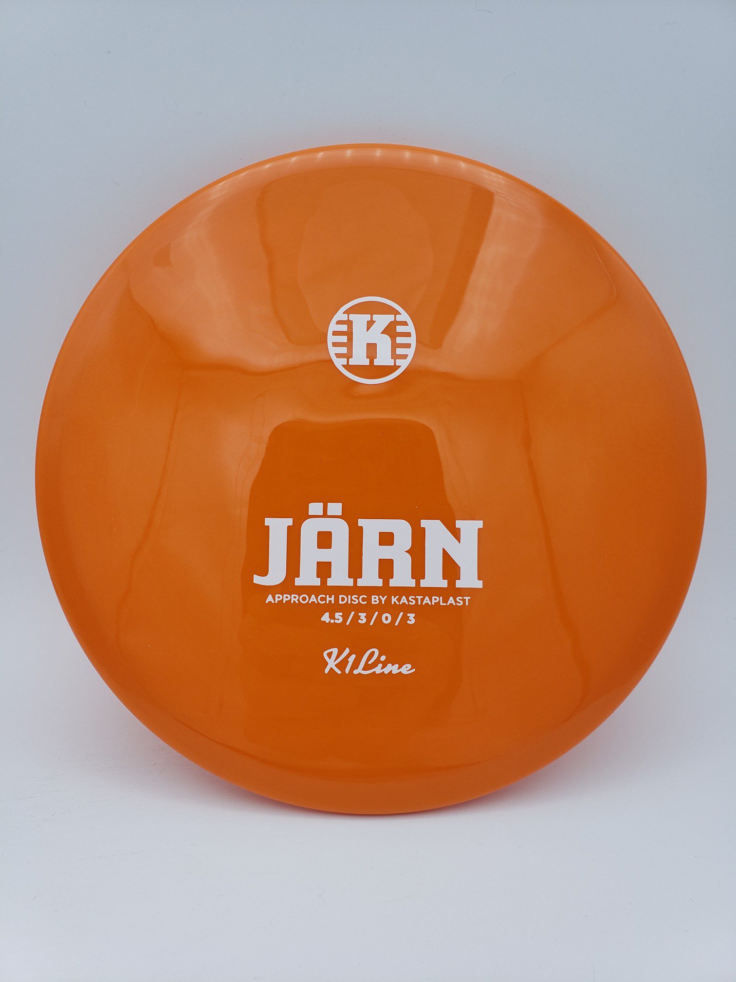 Kastaplast K1 Jrn orange disc golf disc front view