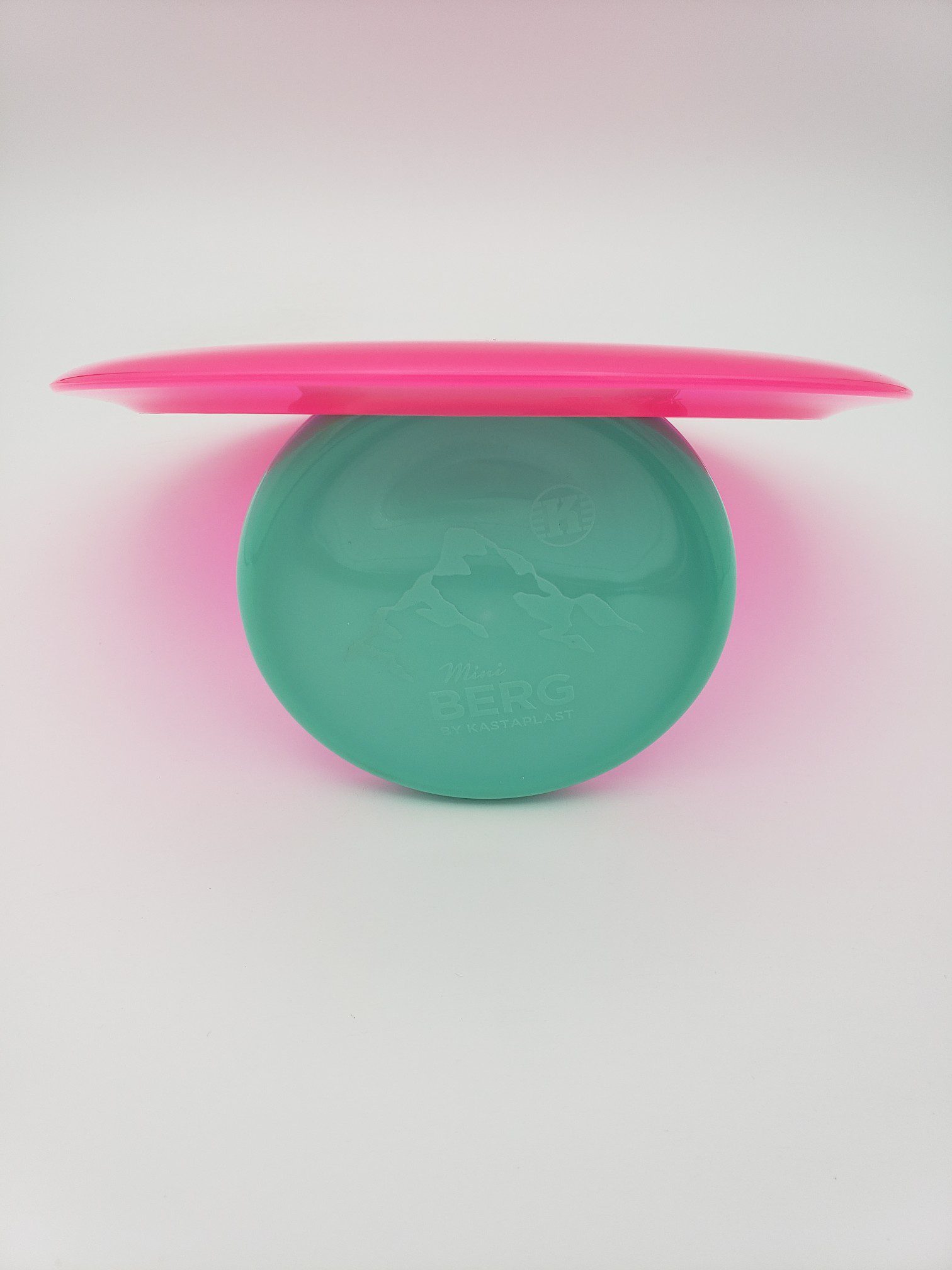 Kastaplast K1 Grym X hot pink disc golf disc back view