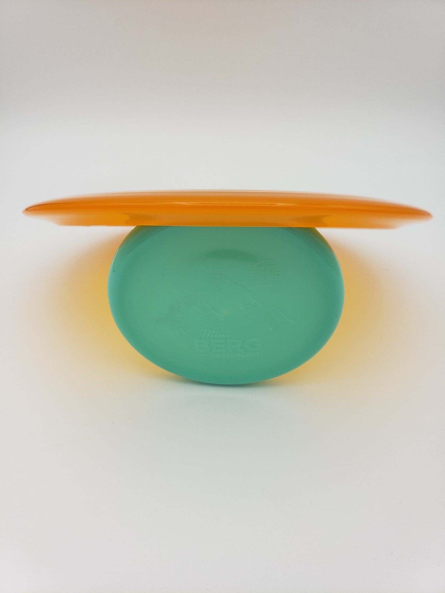 Kastaplast K1 Soft Falk translucent orange disc golf disc back view
