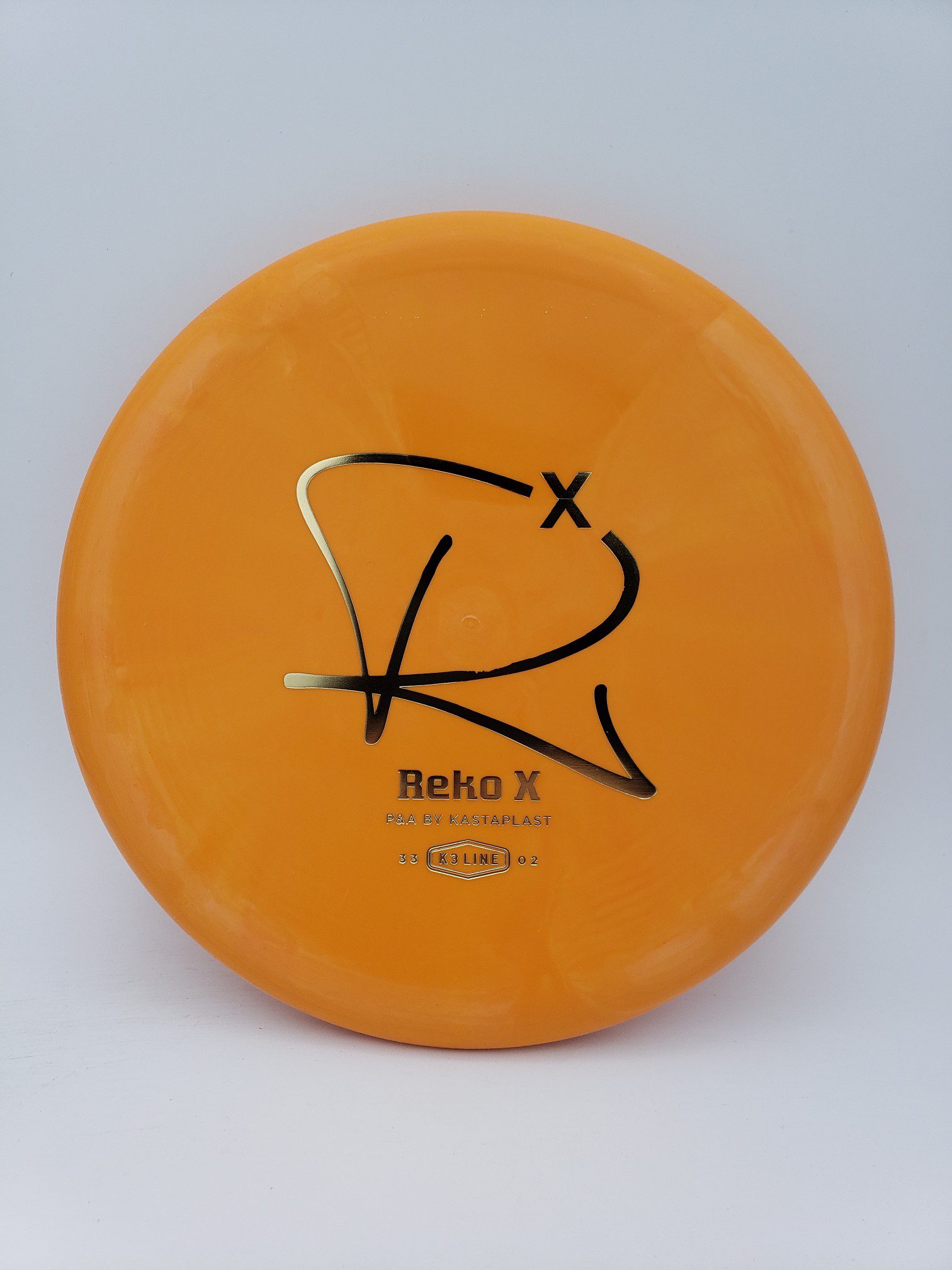 Kastaplast K3 Reko X orange disc golf disc front view