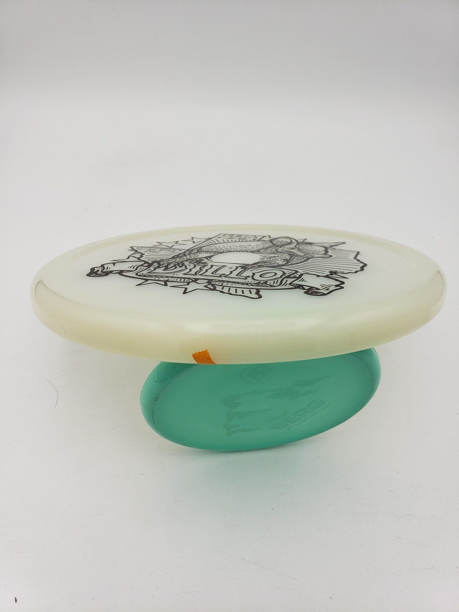 LSD Glow Armadillo disc golf disc back view