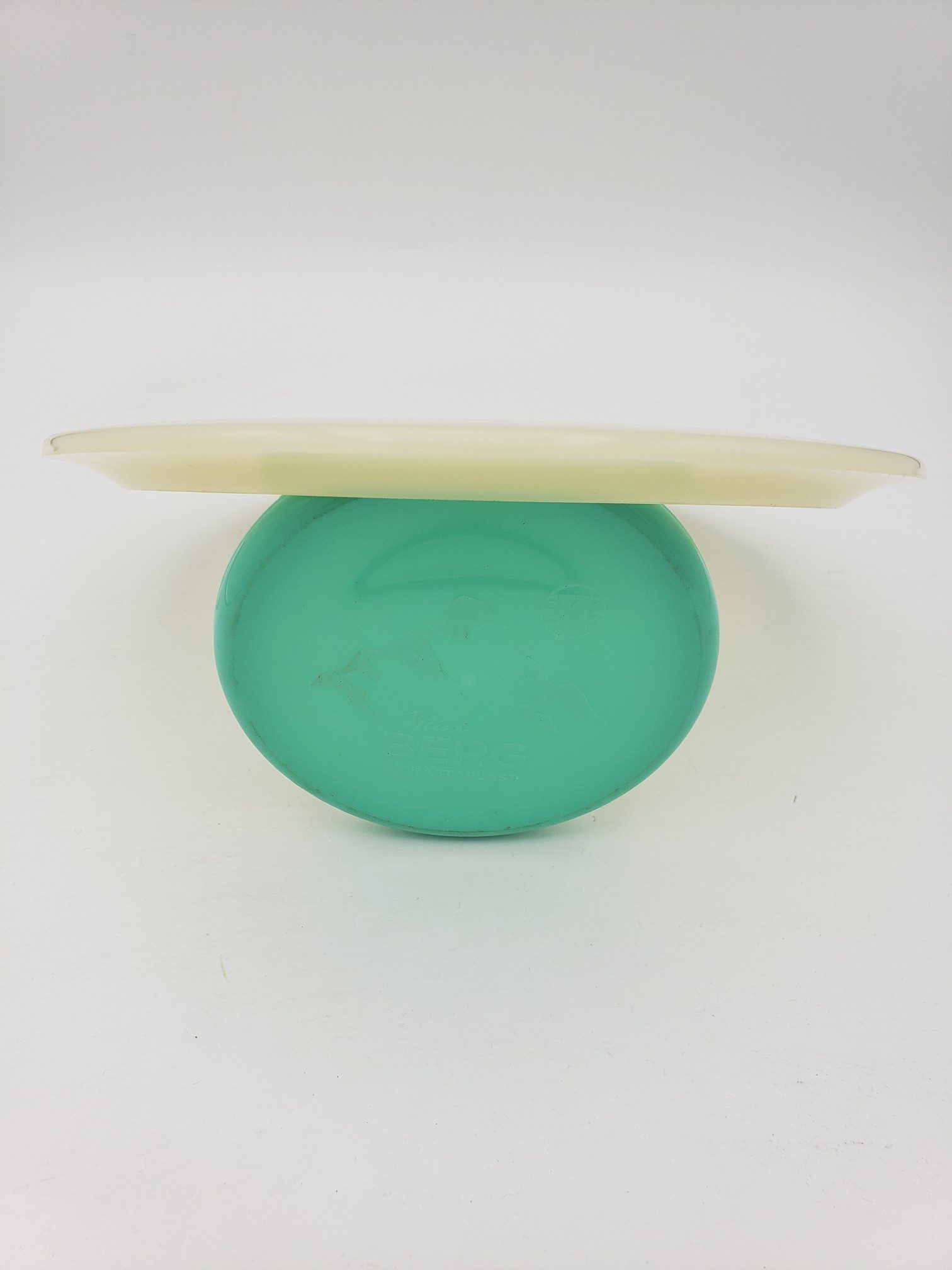 LSD Glow Chupacabra disc golf disc back view