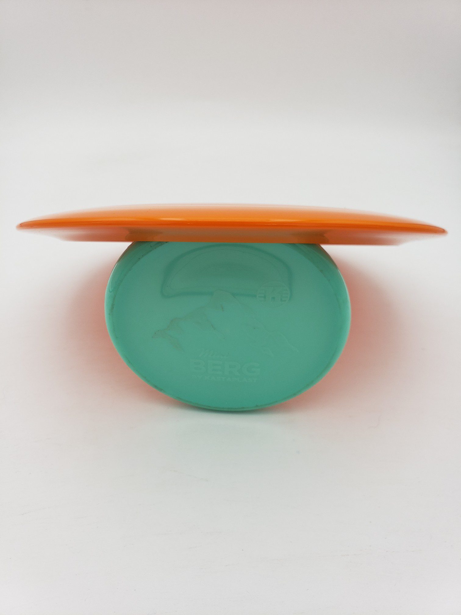 Kastaplast K1 Guld orange disc golf disc back view