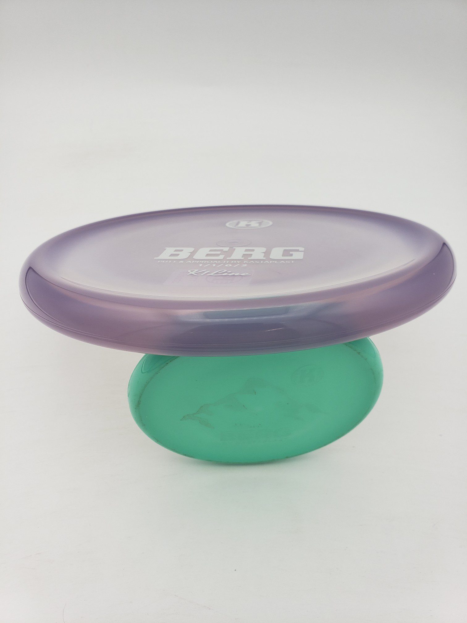 Kastaplast K1 Berg translucent purple disc golf disc back view