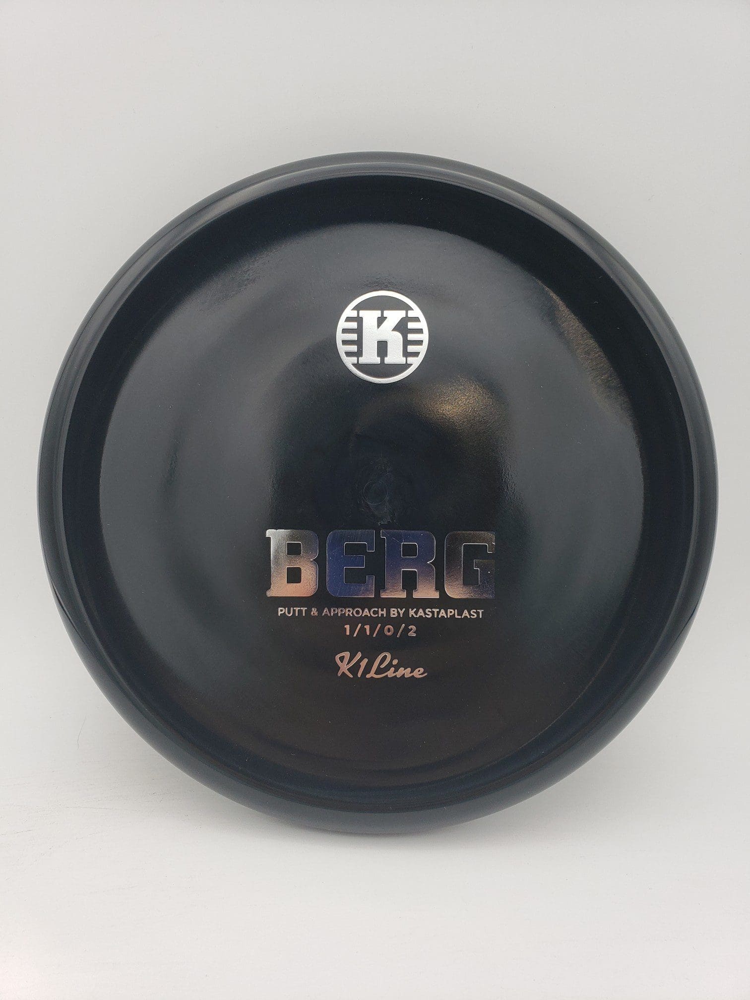 Kastaplast K1 REGRIND Berg black disc golf disc front view