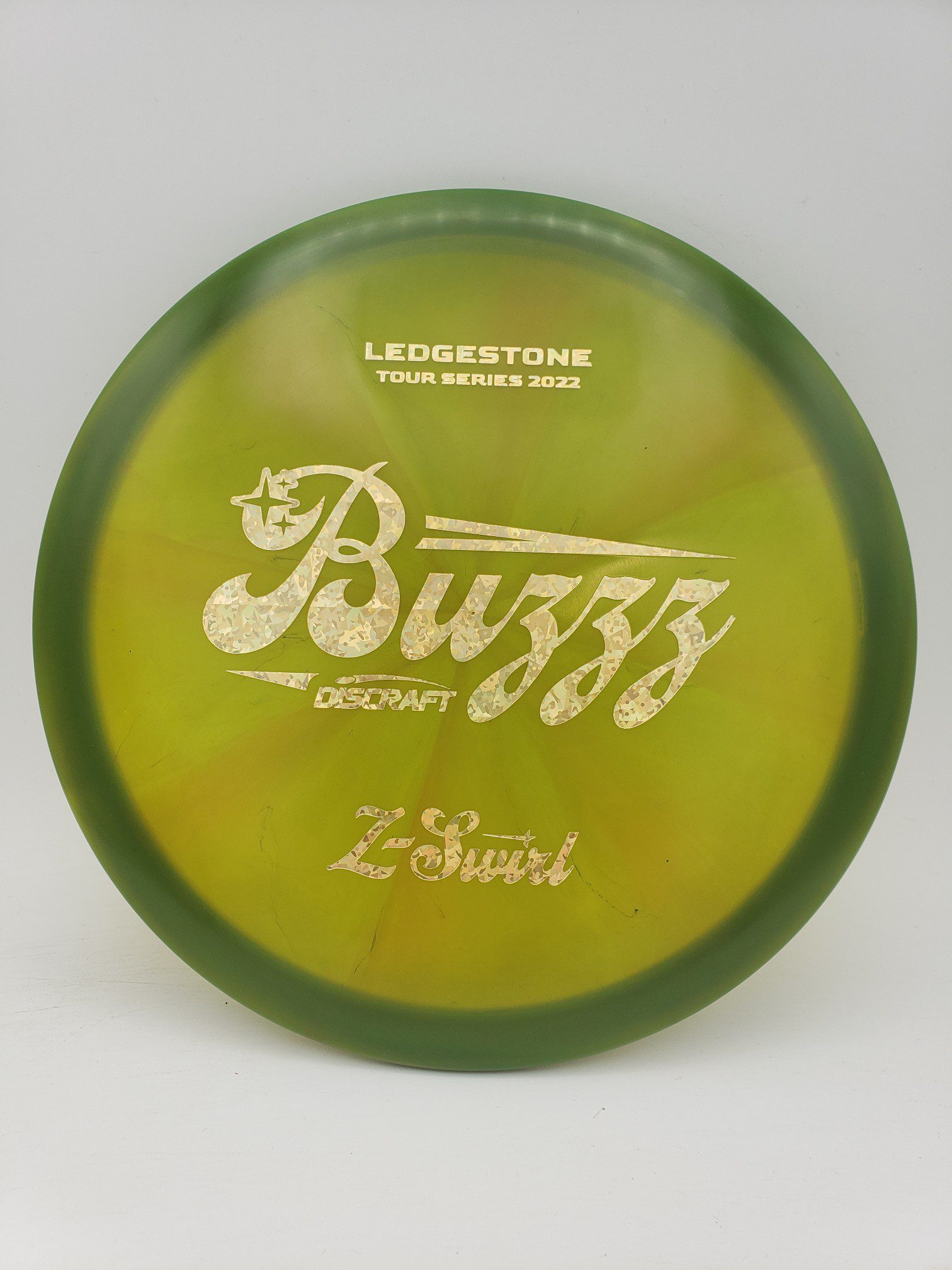 Discraft Ledgestone 2022 Z Swirl Buzzz disc golf disc front view