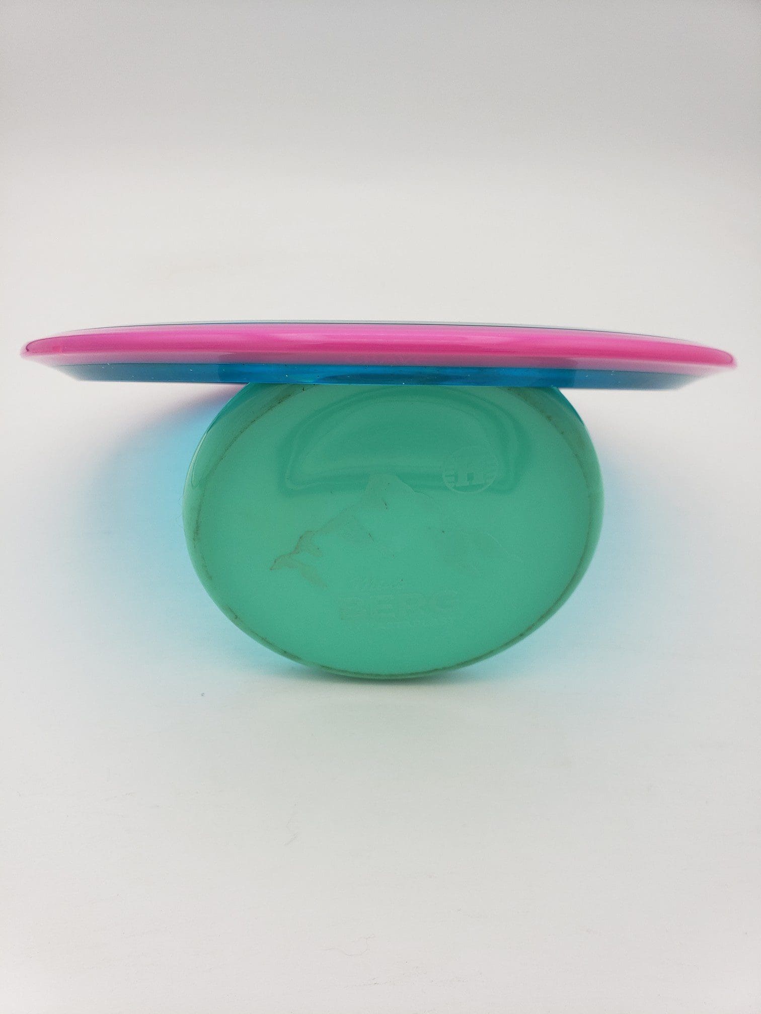 Axiom Proton Crave disc golf disc back view