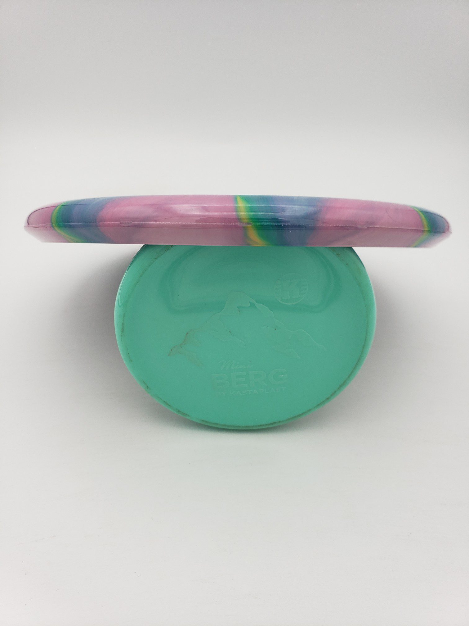 Mint Discs Mason Ford signature Apex Swirl Bullet first run disc golf disc back view