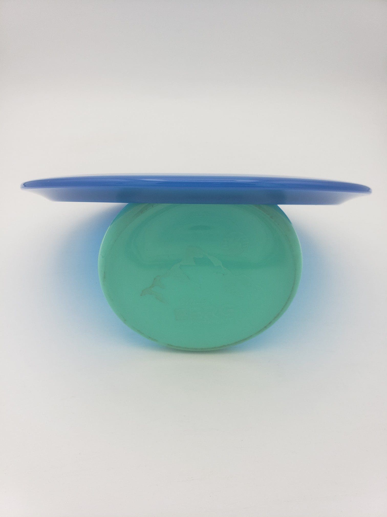 Lft Discs Xenon Alpha-solid blue disc golf disc back view