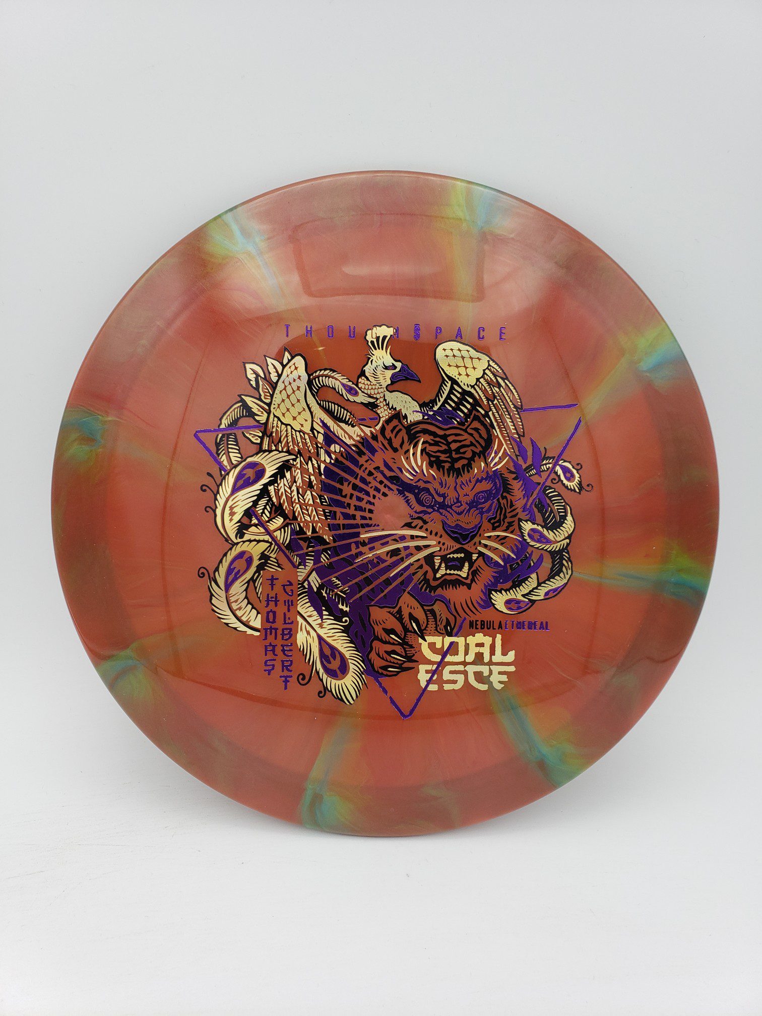 TSA Thomas Gilbert signature Nebula Ethereal Coalesce disc golf disc front view