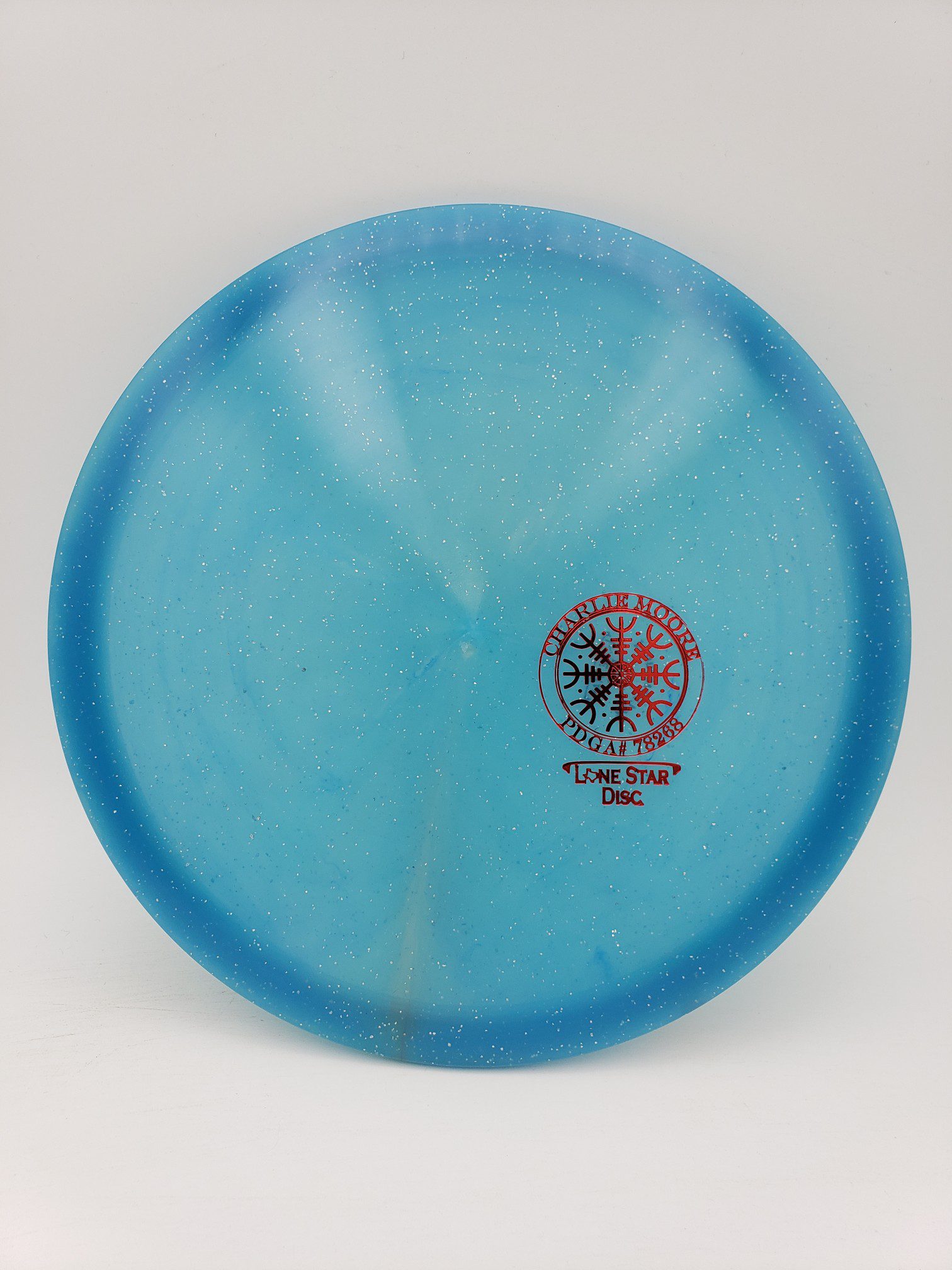 LSD Founder's Middy Charlie Moore tour series disc golf disc front view