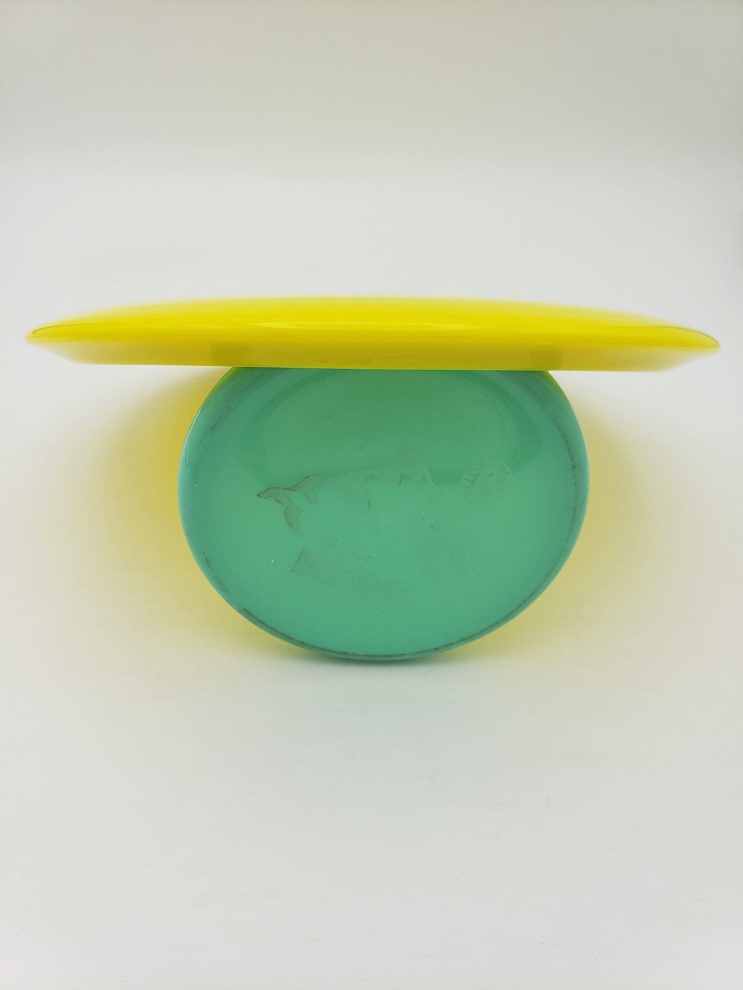 Kastaplast K1 Stig yellow disc golf disc back view