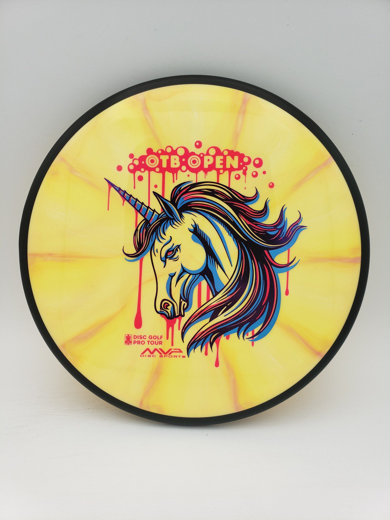 MVP OTB Open 2023 Cosmic Neutron Matrix disc golf disc front view