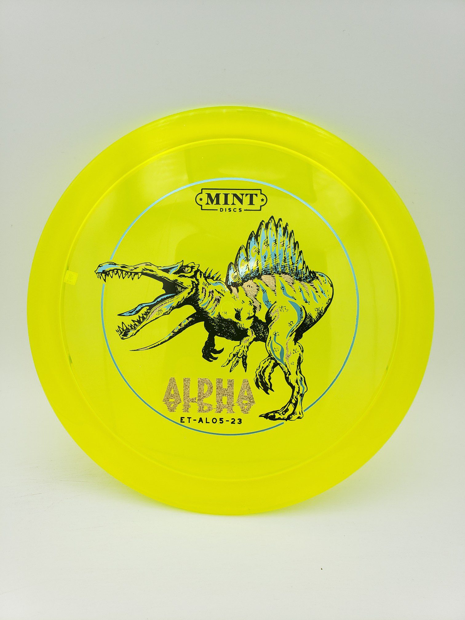 Mint Discs Eternal Alpha Spin-O-Saurus stamp 5th run disc golf disc front view