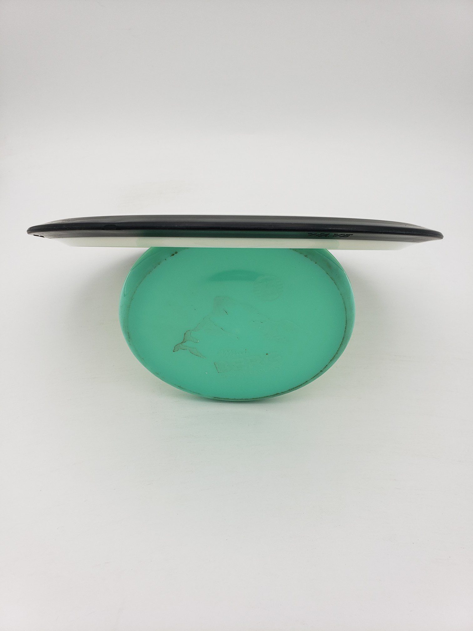 MVP DGLO Neutron Wave disc golf disc back view