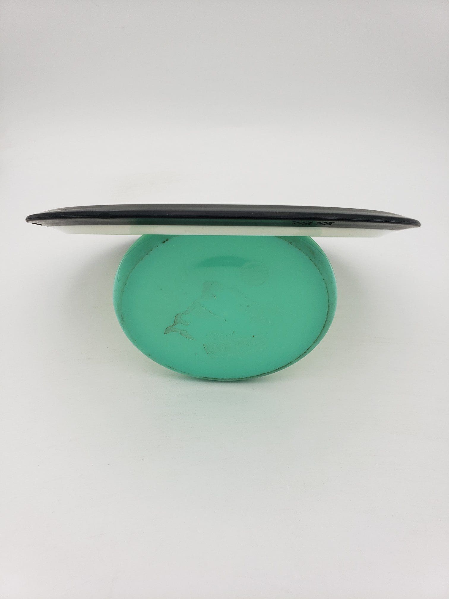 MVP DGLO Neutron Wave disc golf disc back view