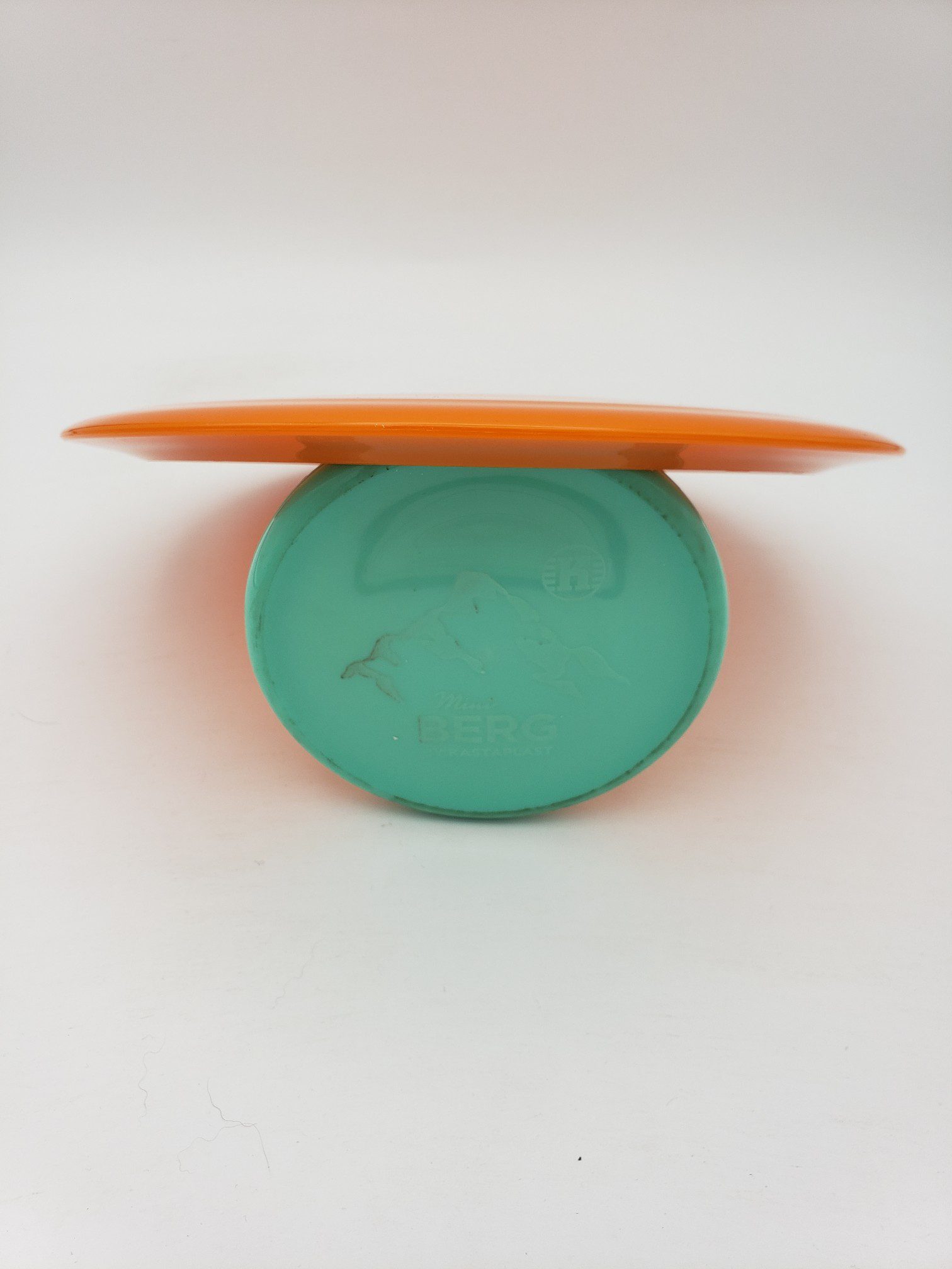 Kastaplast K1 Grym orange disc golf disc back view