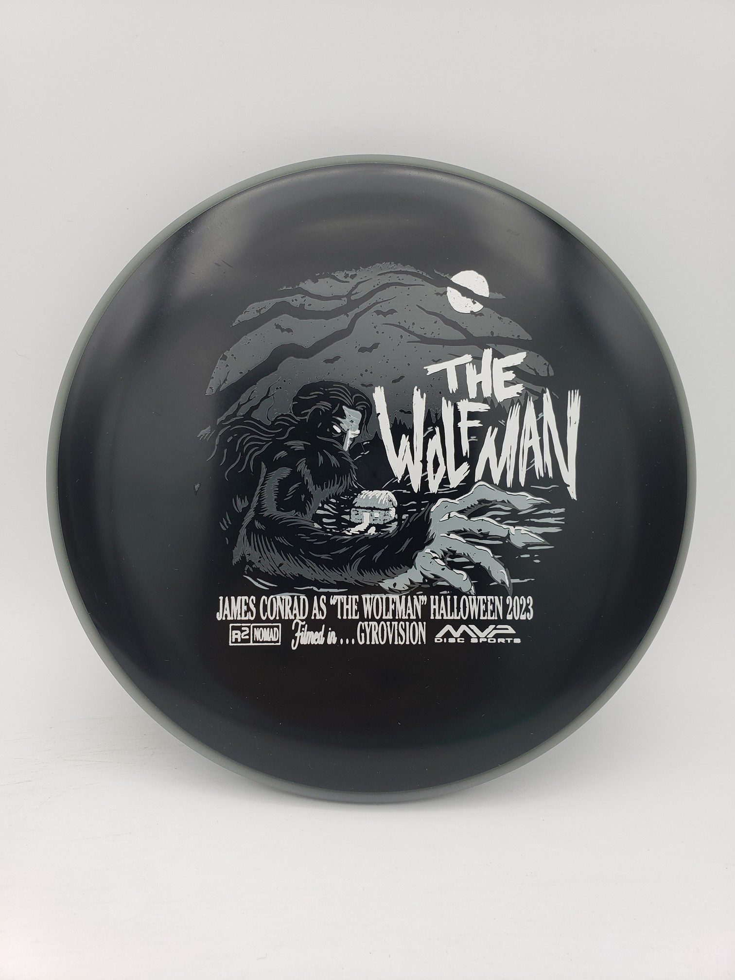 MVP Eclipse R2 Neutron Nomad James Conrad Halloween 2023 disc golf disc side view