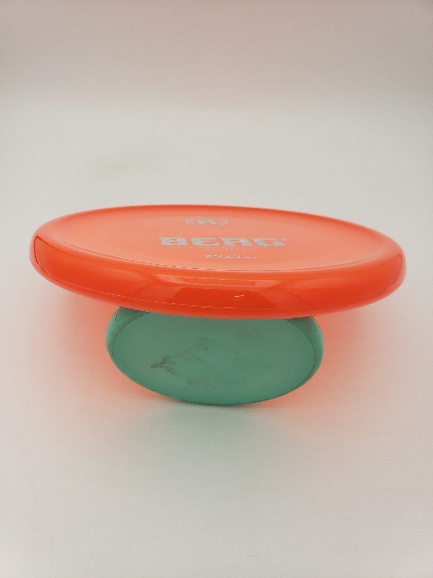 Kastaplast K1 Berg X translucent orange disc golf disc back view