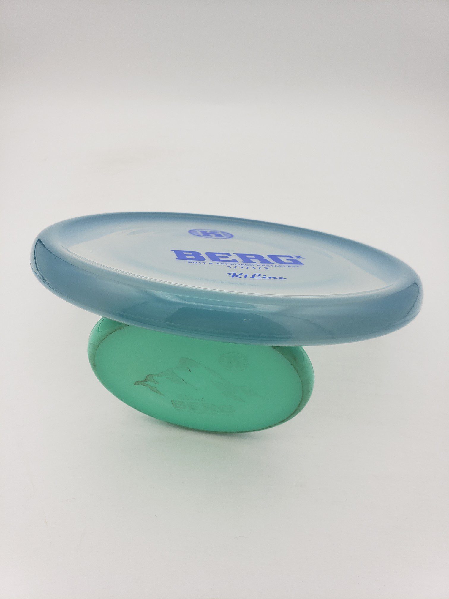 Kastaplast K1 Berg X translucent blue disc golf disc back view