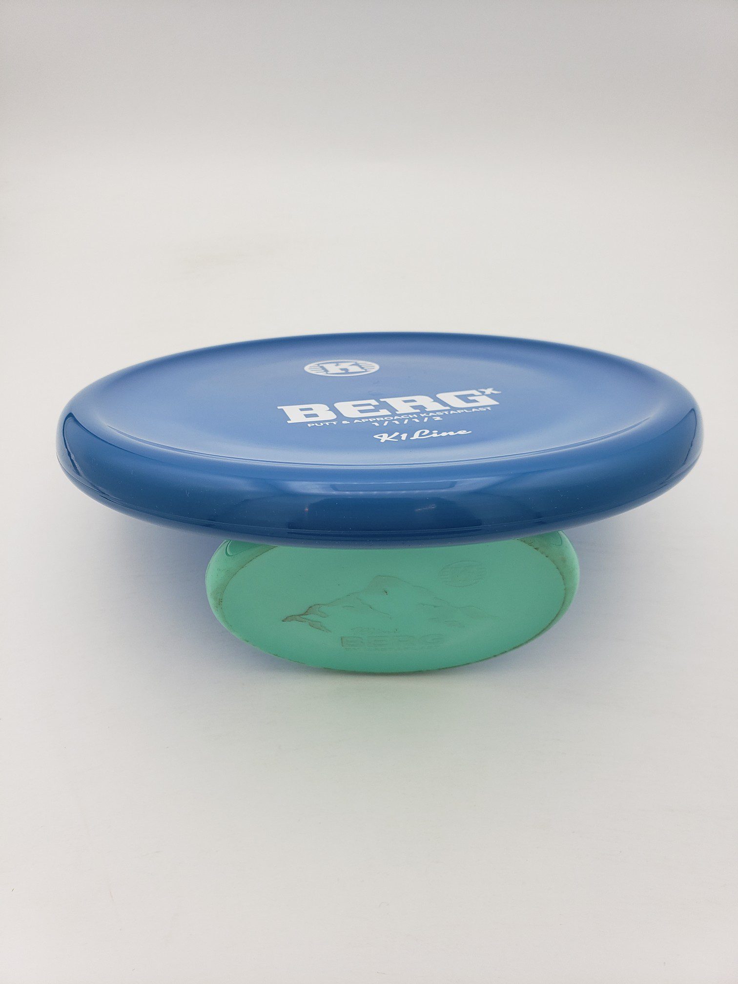 Kastaplast K1 Berg X opaque blue disc golf disc back view