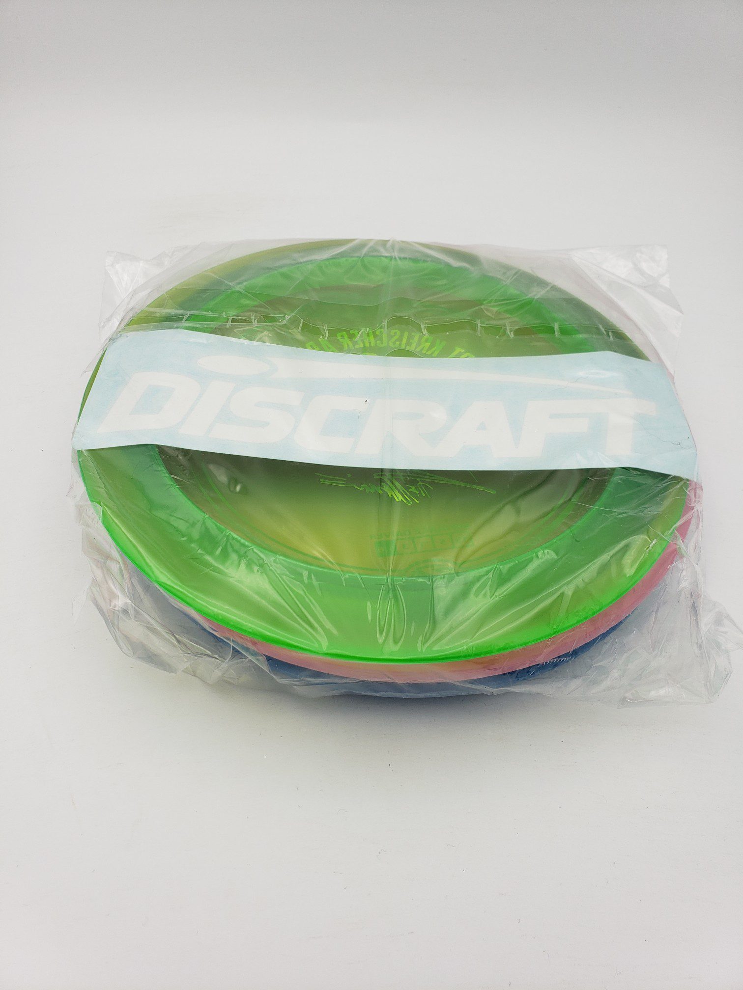 Discraft Bert Kreischer collection SuperColor Buzzz and DGLO 3 pack disc golf disc side view