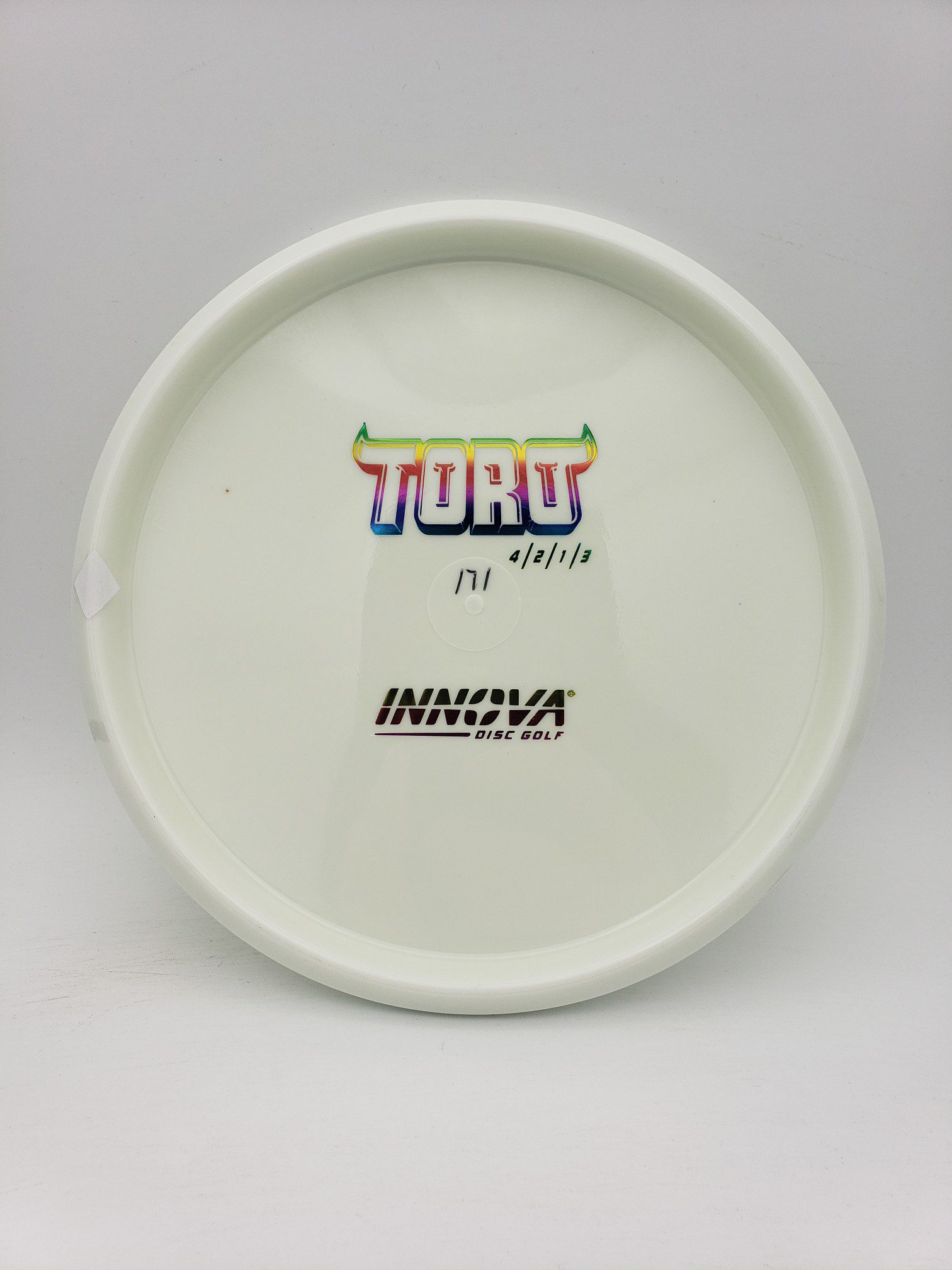 Innova bottom stamped white Star Toro disc golf disc front view